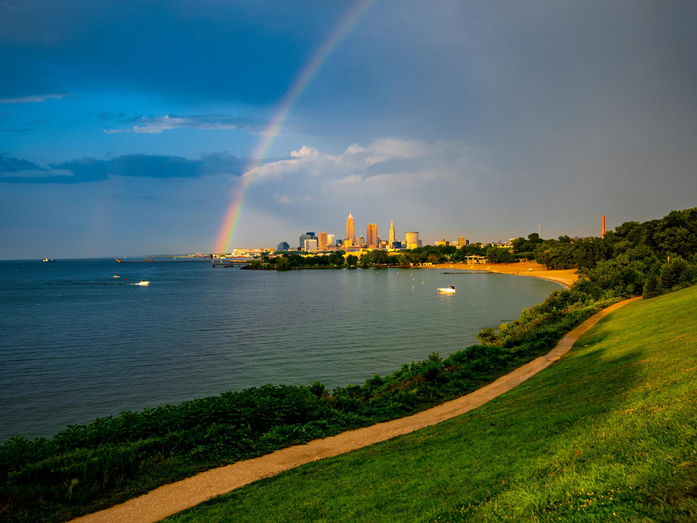 Hill Field Water Rainbow Buildings Landscape